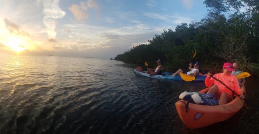 2 ocean kayaks at sunset