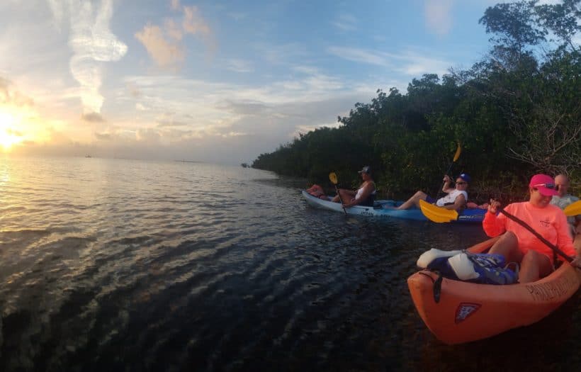 2 ocean kayaks at sunset