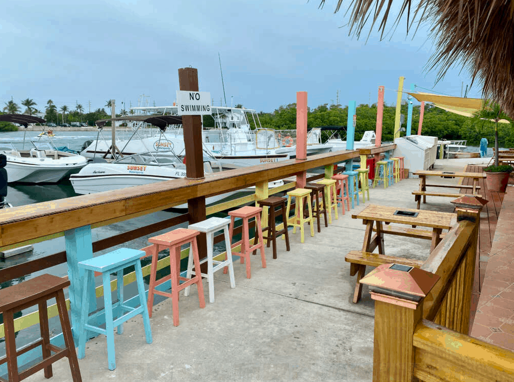 stools and tables on an outside deck at a Key West restaurant