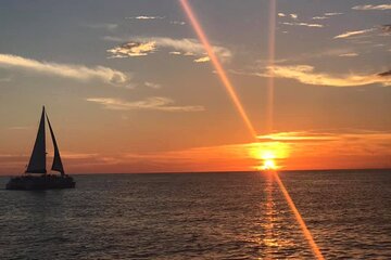 Sunset and Dolphin Sightseeing Sail on the Lazy Daze Catamaran